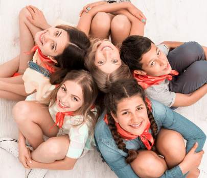 teenagers sitting on the floor